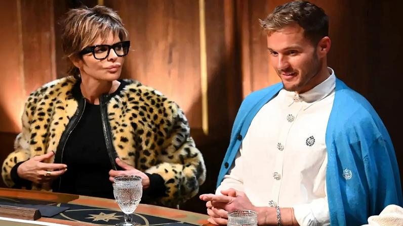 Lisa Rinna called her “Traitors” rival a “stalker” after learning of his past restraining order scandal on Friday.