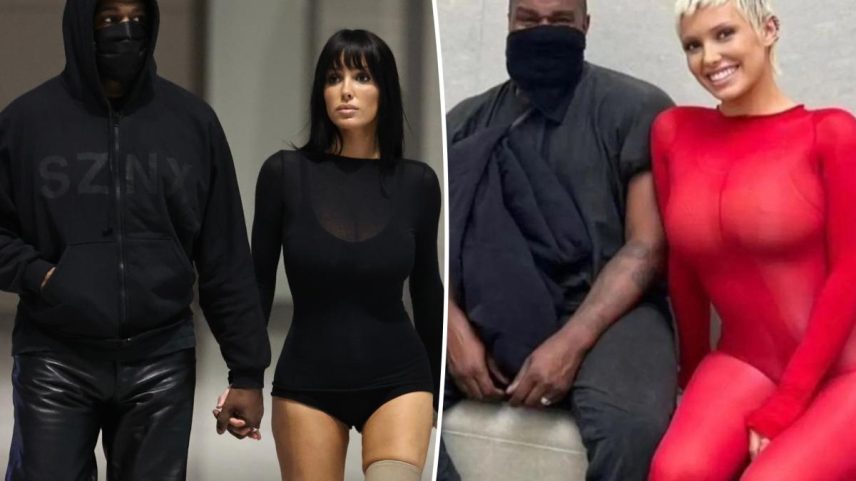 Kanye West in a black hooded jacket and Bianca Censori in a black leather bodysuit.