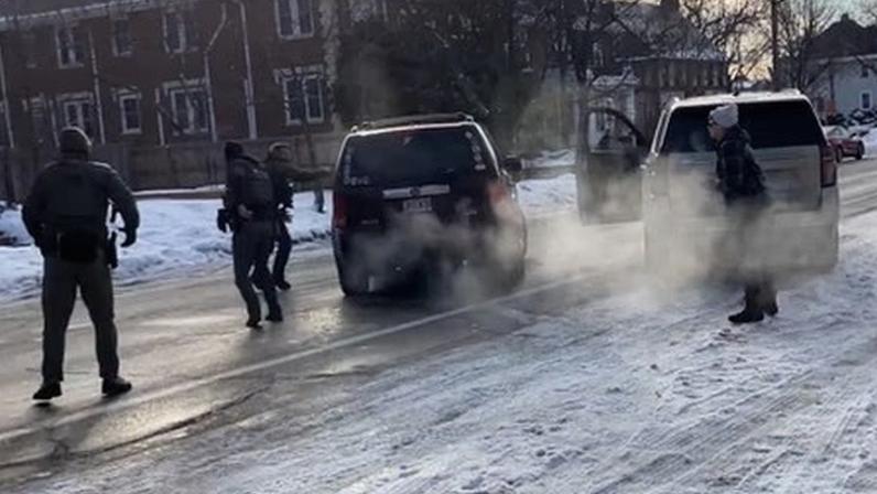 Eyewitness footage appears to capture the moment a federal immigration agent shoots and kills the female driver of a dark red SUV in Minneapolis on Wednesday