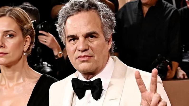 US actor Mark Ruffalo wears a pin reading ‘Be Good’, in tribute to Renee Good, at the 83rd annual Golden Globe Awards.