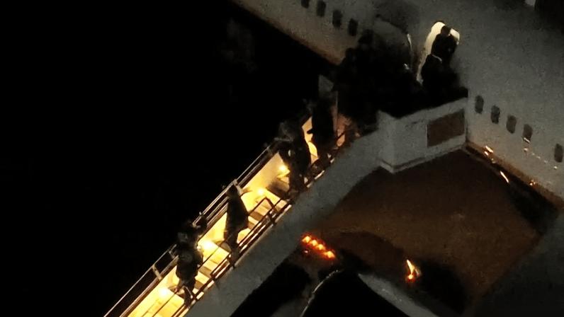 Venezuela's President Nicolas Maduro is led in custody from a U.S. federal airplane before his scheduled court appearance at Manhattan federal court, at Stewart Air National Guard Base in Newburgh, New York, U.S. January 3, 2026. ABC Affiliate WABC via REUTERS NO RESALES. NO ARCHIVES. THIS IMAGE HAS BEEN SUPPLIED BY A THIRD PARTY. MANDATORY CREDIT