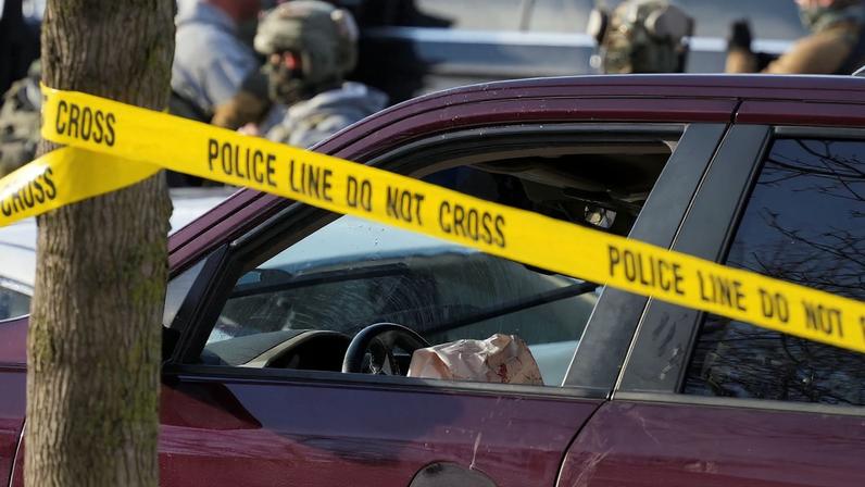 Police tape surrounds a vehicle after its driver was shot by a U.S. immigration agent, according to local and federal officials, in Minneapolis, Minnesota, U.S., January 7, 2026. REUTERS/Tim Evans TPX IMAGES OF THE DAY