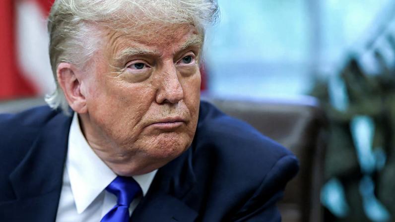 FILE PHOTO: U.S. President Donald Trump looks on as he signs executive orders and proclamations in the Oval Office at the White House, in Washington, D.C., U.S., May 5, 2025. REUTERS/Leah Millis/File Photo