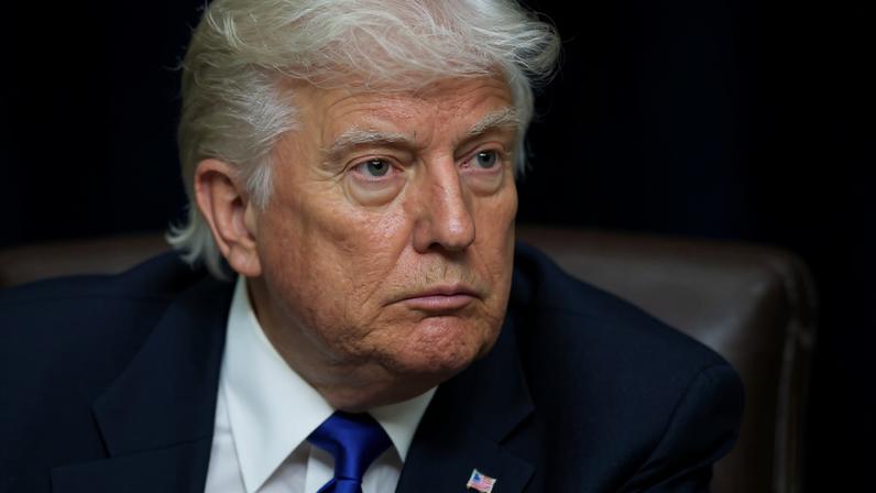 FILE PHOTO: U.S. President Donald Trump looks on as he signs executive orders and proclamations in the Oval Office at the White House, in Washington, D.C., U.S., May 5, 2025. REUTERS/Leah Millis/File Photo