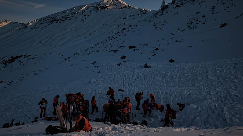 Rescuers search for people after an avalanche in the Salzburg Pongau region in Austria’s west on Saturday.