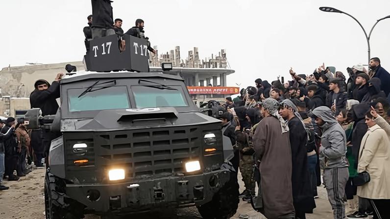 Members of Syrian Democratic Forces (SDF) arrive at the Kurdish-held city of Kobane after withdrawing from the Al-Aqtan prison in the Raqa province of Syria.