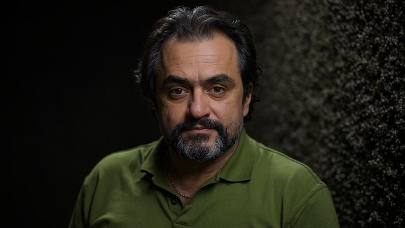 ‘My library was my lifework, and I didn’t know if I, or it, would survive the night’ … Amir Mehdi Haghighat pictured in Tehran, 2024