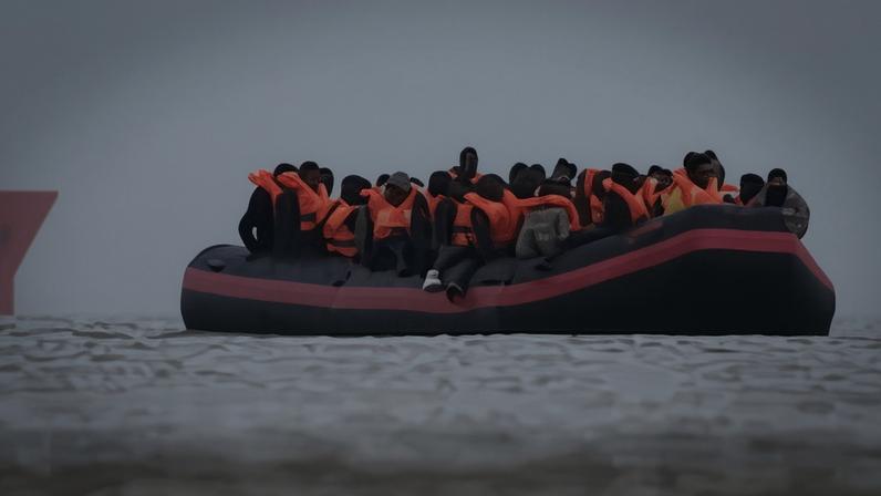 People in a small boat off the coast of France. In a post on X about the banning of 10 British nationals, the French interior ministry said: ‘Violent and hate inciting tactics have no place in our territory.’ Photograph: Gareth Fuller/PA