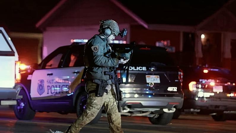 Police have launched a manhunt after a deadly shooting outside a Mormon church in Salt Lake City.