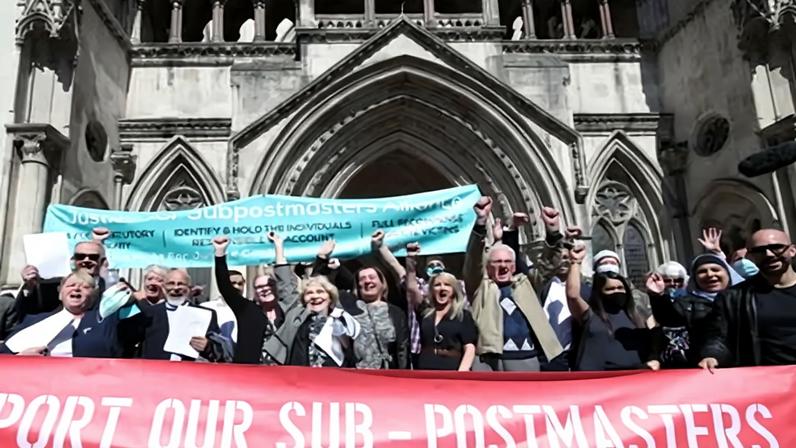 Former post office workers celebrating outside the Royal Courts of Justice after their convictions were overturned by the Court of Appeal in 2021.