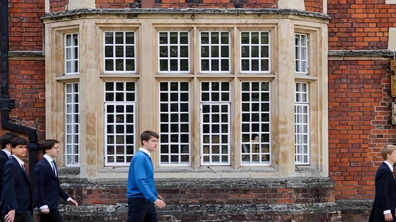Students walk outside Eton College in Windsor.