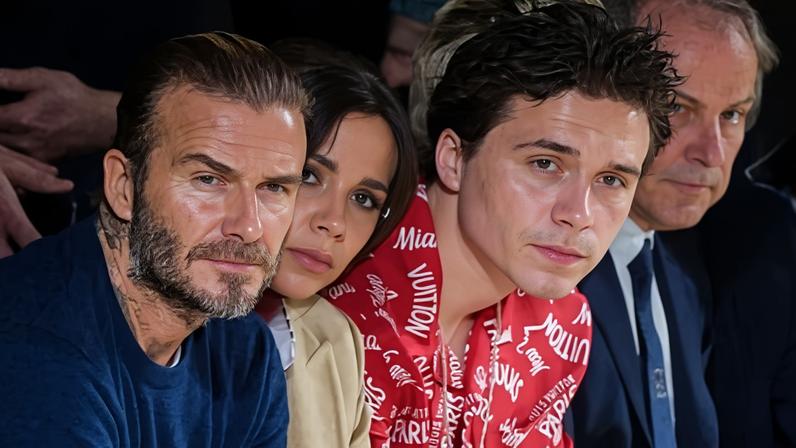 David and Victoria Beckham with their son Brooklyn at a show at Paris fashion week, January 2018.