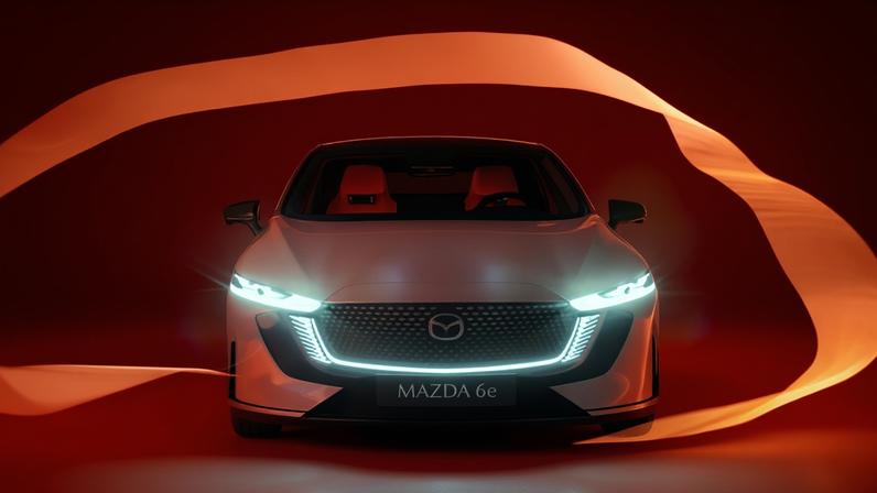 Mazda will launch its first electric vehicle, the Mazda 6e, in Australia this year. Experts have warned government against stifling the EV market through a road-user charge and tax changes.