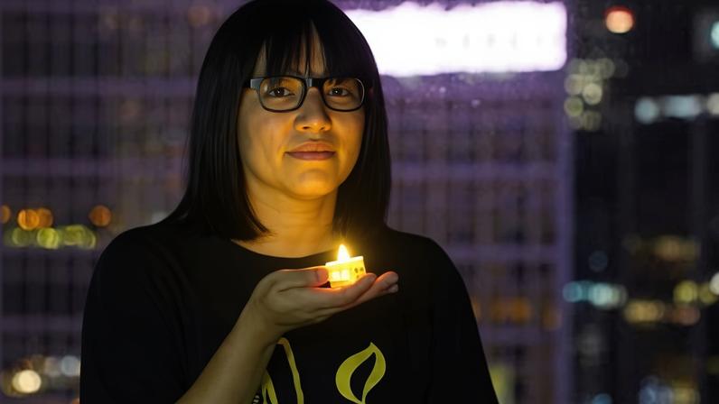Chow Hang-tung (seen here in June 2021 before a vigil on the anniversary of the Tiananmen Square massacre) has been detained for more than four years.