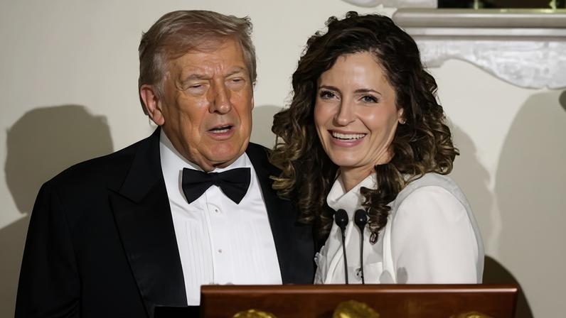 Donald Trump stands with Julia Letlow during the congressional ball at the White House on 11 December 2025.