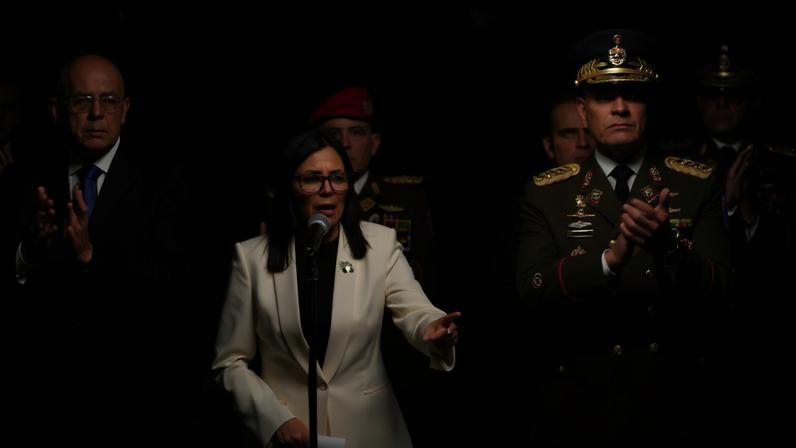 Venezuela's interim president Delcy Rodriguez, alongside Defence Minister Vladimir Padrino Lopez, delivers a speech, during the ceremony "Promotions and Decorations for Heroes and Martyrs", honouring Venezuelan and Cuban military and security personnel who died during a U.S. operation to capture Venezuela's President Nicolas Maduro and his wife Cilia Flores, in Caracas, Venezuela, January 8, 2026. REUTERS/Leonardo Fernandez Viloria