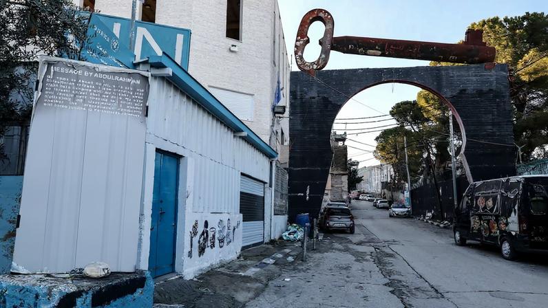 The Palestinian key of return lies on the entrance arch of the camp near an UNRWA center, in the Aida refugee camp in Bethlehem