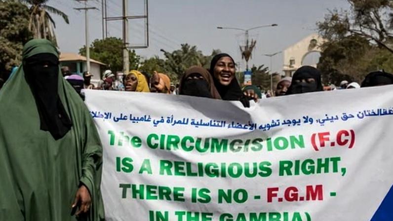 Pro-FGM protesters demonstrating outside the Gambia’s parliament in Banjul in 2024. Almost 75% of women in the country have been cut, usually as infants.