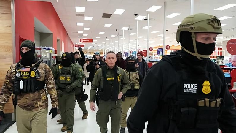 US border patrol commander Gregory Bovino walks through a Target store in St Paul, Minnesota, on 11 January.