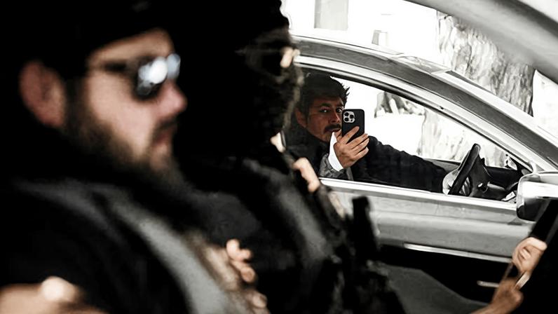 A community member films federal agents conducting an immigration enforcement action in Saint Paul, Minnesota, on 27 January 2026.