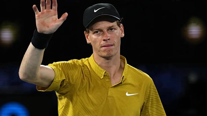 Jannik Sinner celebrates after defeating Eliot Spizzirri amid extreme heat on day seven at Melbourne Park.