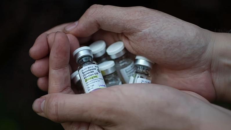 A man holds a supply of his testosterone medication