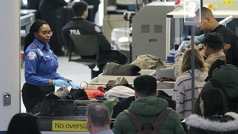 Passengers line up at a TSA checkpoint at Newark Liberty international airport in New Jersey.