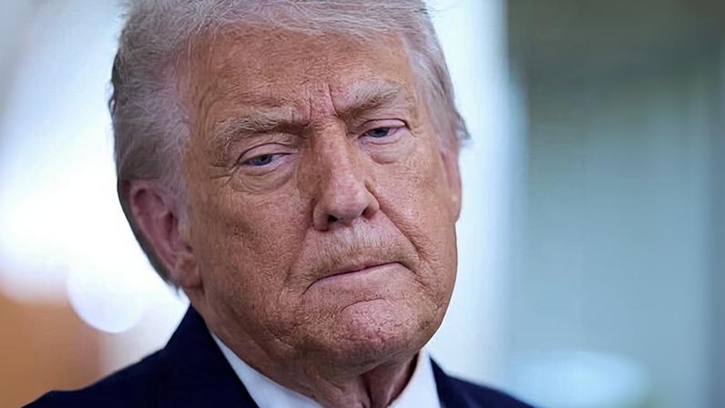 A portrait of Donald Trump looking pensive