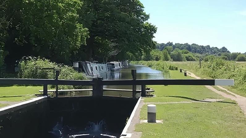 Waverley Borough Council Narrowboats in the Godalming Navigations Conservation Area along the river Wey.