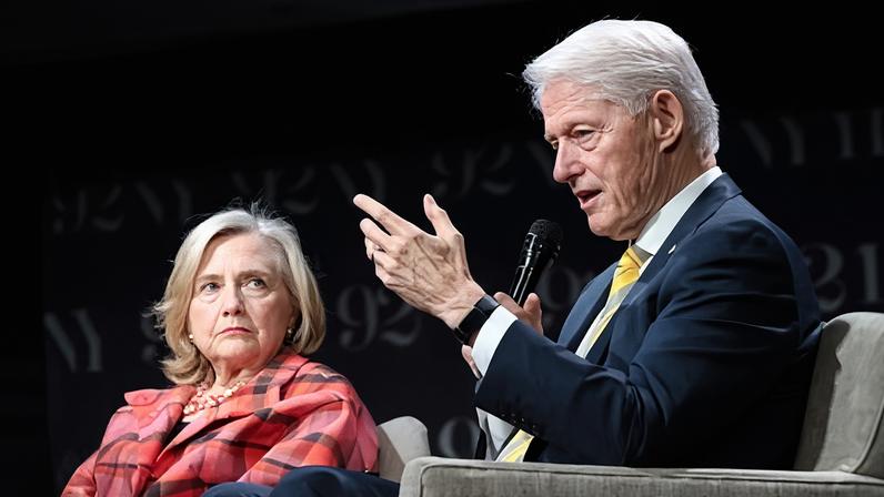 Bill Clinton speaks alongside his wife, Hillary Clinton, in New York, on 4 May 2023.