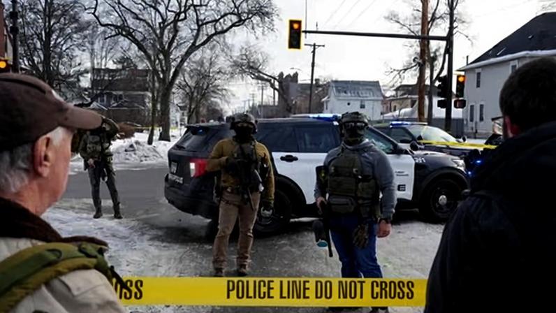 Members of U.S. Immigration and Customs Enforcement (ICE) stand guard after a driver of a vehicle was shot in Minneapolis, Minnesota on 07 January 2026.