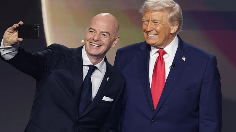 Fifa president Gianni Infantino takes a selfie with Donald Trump at the World Cup draw.