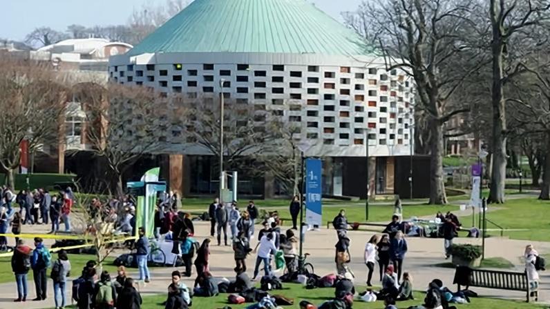 Students on campus at the University of Sussex.