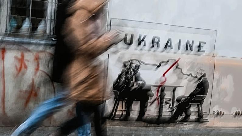 A mural by Norwegian street artist Toddel in Krakow, Poland depicting Donald Trump and Vladimir Putin at a table next to a map of a divided Ukraine. The Ukrainian and Russian sides are expected to convene this weekend for the first time since the outset of the war.