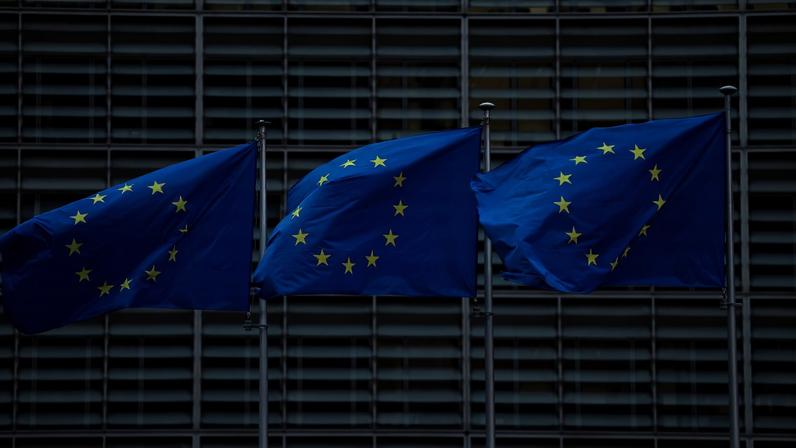 European Union flags flutter outside the European Commission headquarters, on the day of a European Union leaders' summit in Brussels, Belgium, December 18, 2025. REUTERS/Stephanie Lecocq/File Photo