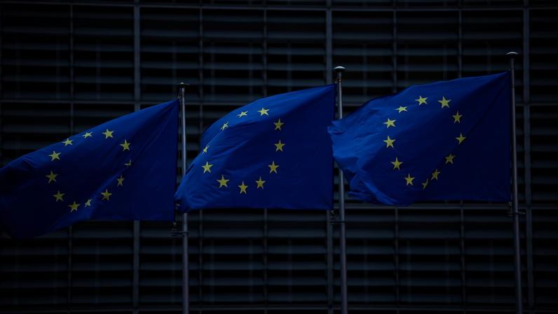 European Union flags flutter outside the European Commission headquarters, on the day of a European Union leaders' summit in Brussels, Belgium, December 18, 2025.