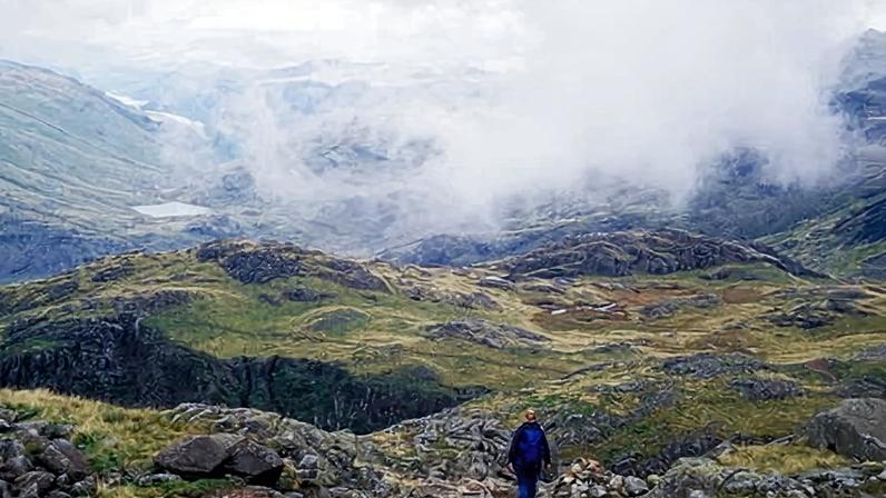 File photo of hiker on Scafell Pike. The seven-hour operation by Wasdale mountain rescue team took place overnight on 29-30 December.