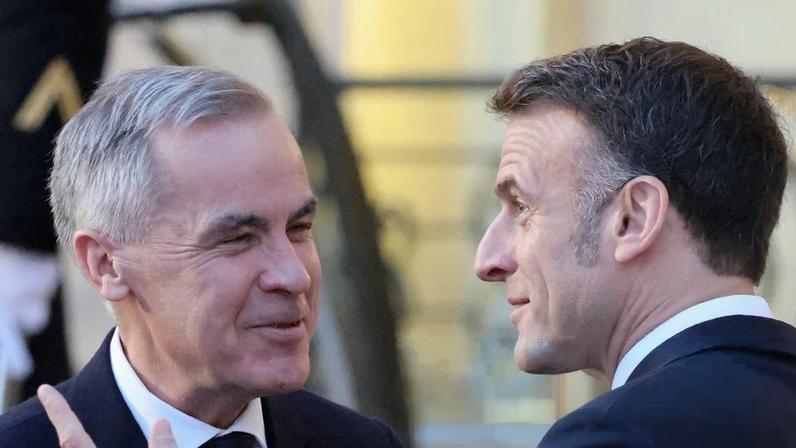 The Canadian prime minister, Mark Carney, joins the French president, Emmanuel Macron, at the Élysée Palace on Tuesday.
