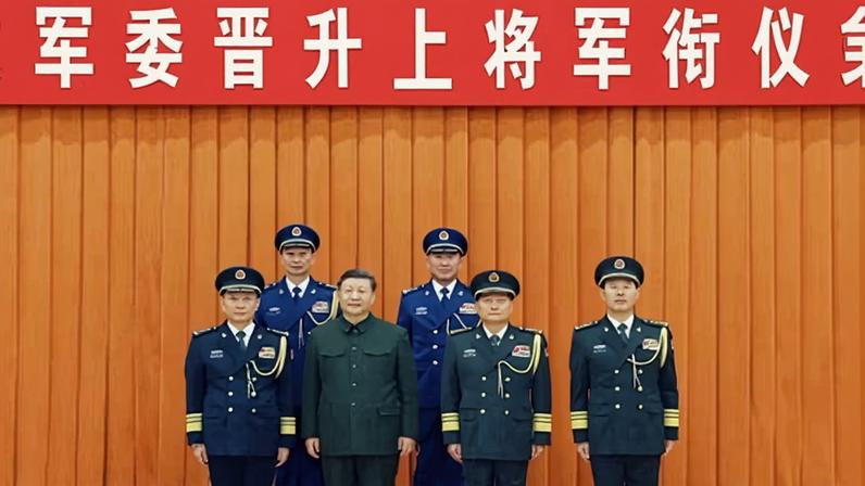 Xi Jinping and military leaders attend a ceremony in December. In the front row left to right are Zhang Shengmin, Xi, Zhang Youxia and Liu Zhenli.