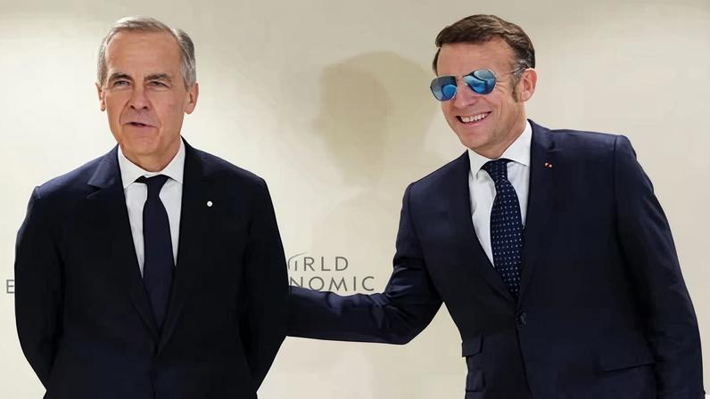 Mark Carney and Emmanuel Macron attend the World Economic Forum in Davos, Switzerland.