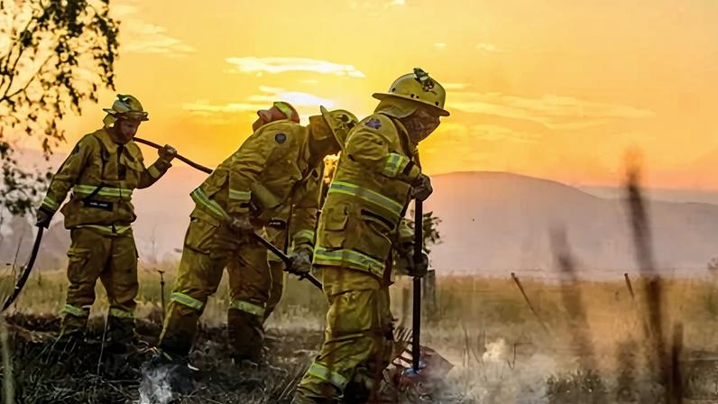CFA firefighters at work after the bushfire near Alexandra, Victoria. In the current climate, Australians should expect heatwaves similar to the January event about once every five years, the analysis suggests.