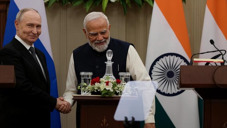 Vladimir Putin with Indian PM Narendra Modi last month.