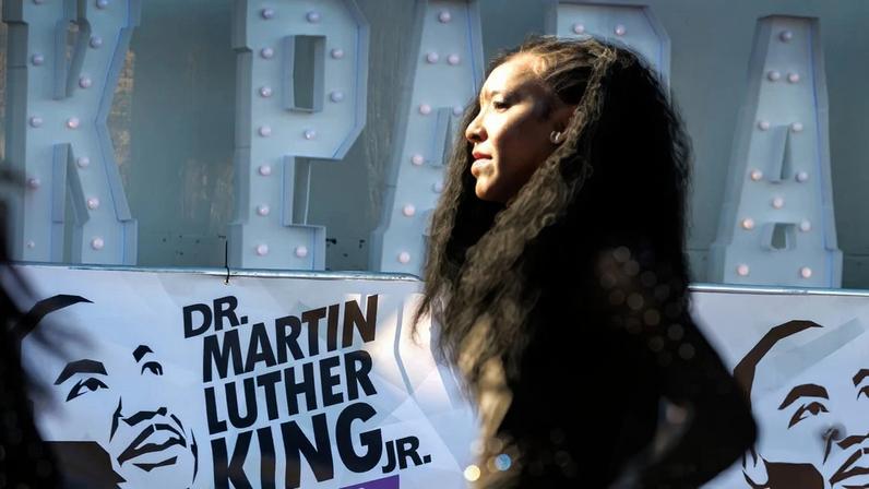 People participate in the Martin Luther King Jr parade in Miami, Florida, on Monday.