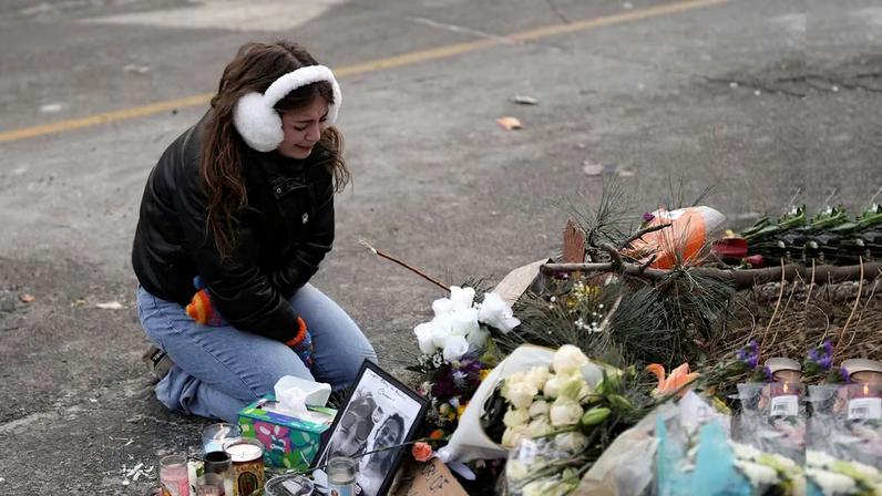 Makeshift memorial at the site where Alex Pretti was fatally shot by federal immigration agents, in Minneapolis