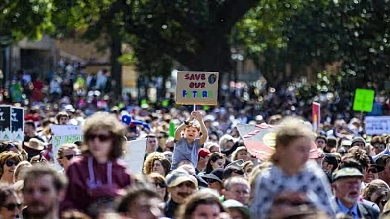 School students and protesters gather for the climate strike rally at the Domain in Sydney in 2019. The site could be flagged for protests under further measures being considered by the NSW premier, Chris Minns.