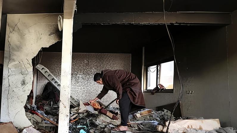 An apartment block was damaged on Saturday by Israeli strikes on Gaza City – the attacks reportedly killed at least 12 people in Gaza.