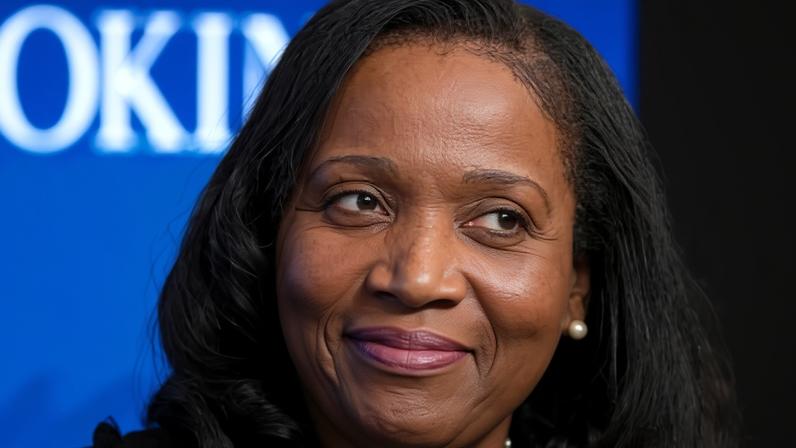 The Trump administration has alleged that Lisa Cook, above, committed mortgage fraud by misrepresenting multiple properties as her primary residence.