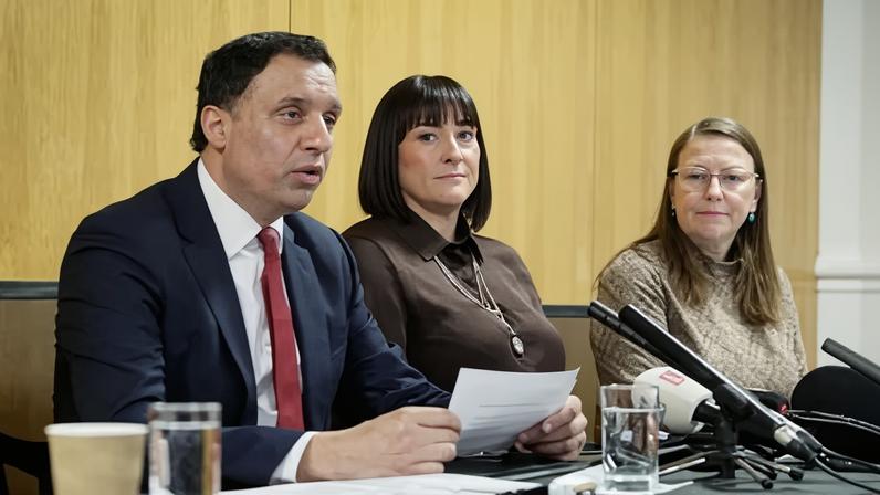 Anas Sarwar, left, is joined by Maureen Dynes, right, and Kimberly Darroch, both of whom lost family members after they caught infections.
