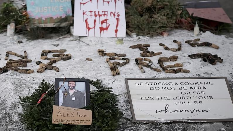Makeshift memorial at the site where Alex Pretti was fatally shot by federal immigration agents, in Minneapolis.