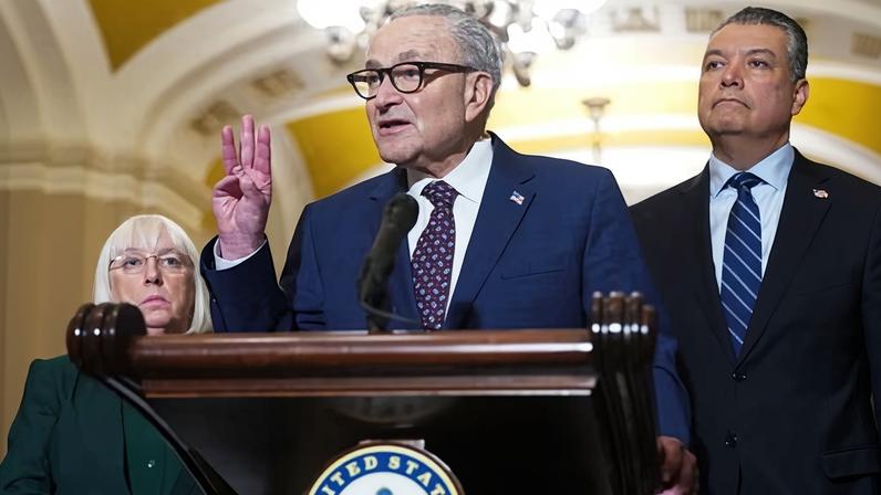 Senate minority leader Chuck Schumer speaks to the media at the US Capitol in Washington, on Wednesday.